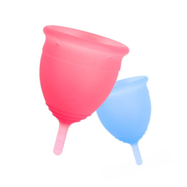 Floating menstrual cups, pink and blue.